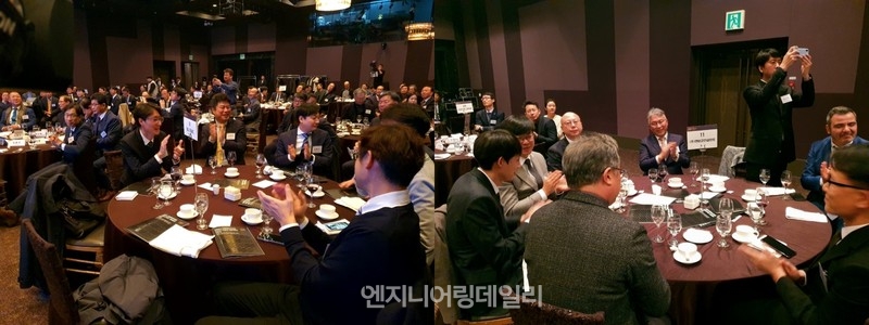 튀르키예 차나칼레 대교의 대상이 발표되자 디엘이앤씨 직원들과 엔비코 직원들이 환호하고 있다.